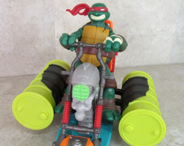 Raph holding Sewer Cruiser controls