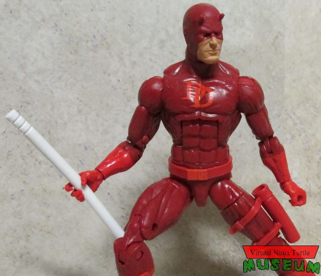 Daredevil holding staff